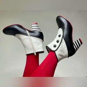 Elegant Black and Cream Heeled Boots